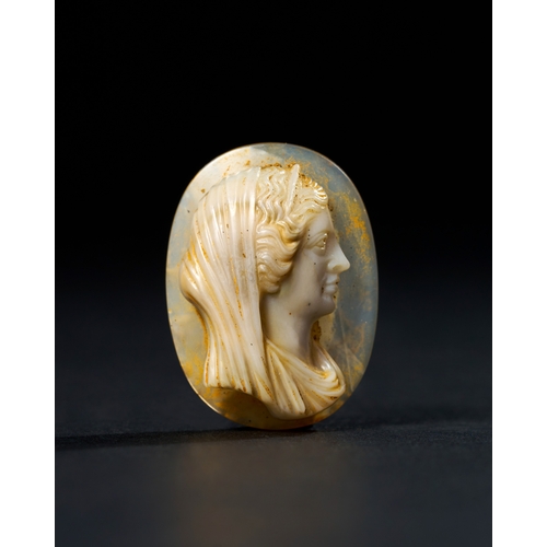 13 - A ROMAN SARDONYX AGATE CAMEO DEPICTING A DEITY, 2ND CENTURY A.D. OR LATER This exquisite Roman cameo... 