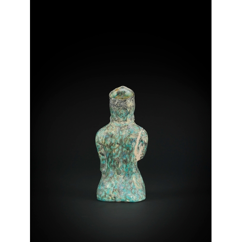 135 - AN ISLAMIC TURQUOISE STATUE OF A SEATED RULER, KASHAN, IRAN, 13TH CENTURY    The figure is depicted ... 