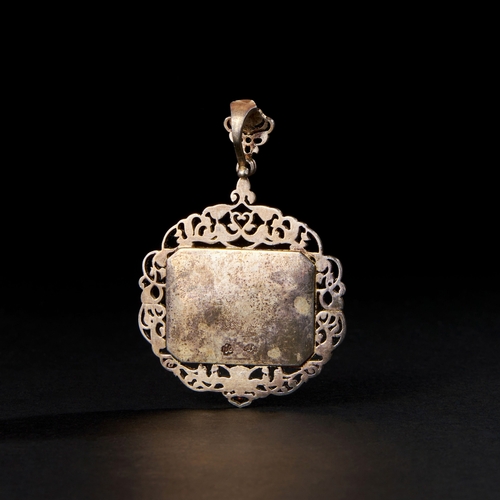 146 - SILVER AND AGATE STONE WITH QURANIC ENGRAVING PENDANT, QAJAR, 19TH CENTURY The pendant features an i... 