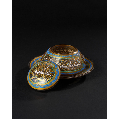 164 - ISLAMIC ENAMELED GLASS JAR WITH UNDER PLATE, 19TH CENTURY The jar is adorned with intricate enameled... 