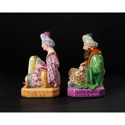 166 - A PAIR OF PORCELAIN SEATED SULTAN AND SULTANA FIGURINES, JACOB PETIT, FRANCE, 19TH CENTURY The figur... 