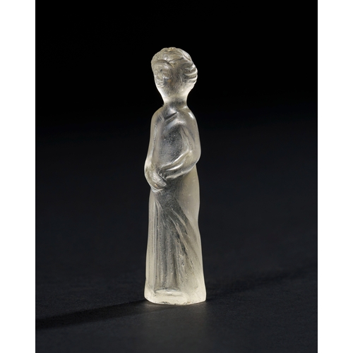 19 - A ROMAN ROCK CRYSTAL FIGURE OF A DEITY, CIRCA 1ST CENTURY A.D. OR LATER This delicate Roman rock cry... 