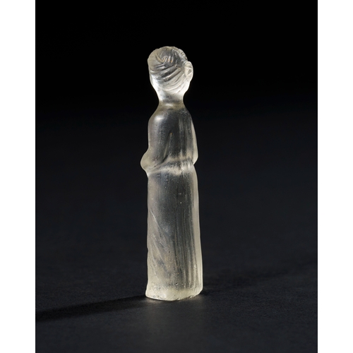 19 - A ROMAN ROCK CRYSTAL FIGURE OF A DEITY, CIRCA 1ST CENTURY A.D. OR LATER This delicate Roman rock cry... 