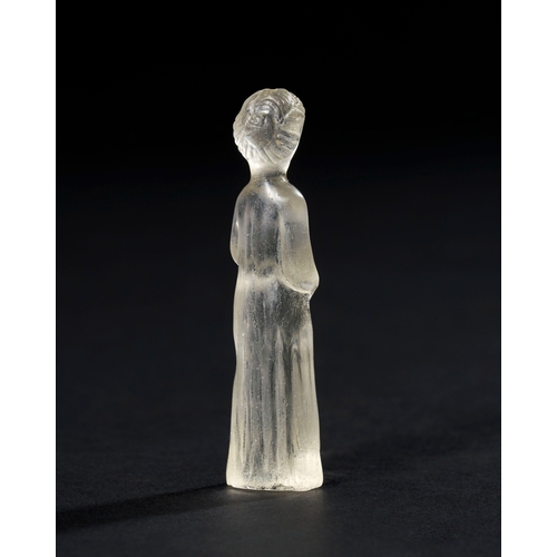 19 - A ROMAN ROCK CRYSTAL FIGURE OF A DEITY, CIRCA 1ST CENTURY A.D. OR LATER This delicate Roman rock cry... 