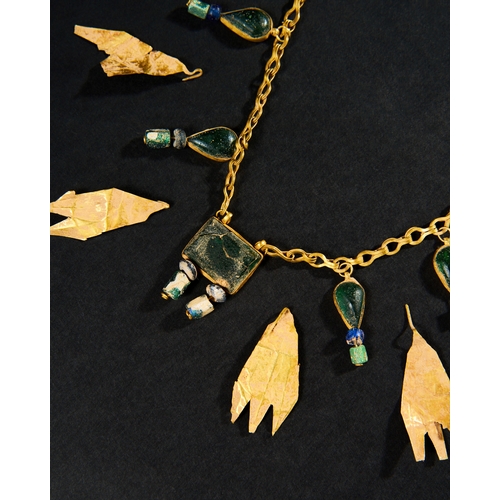 32 - ARCHAIC PERIOD GOLD NECKLACE WITH WREATH GOLD LEAFS Archaic period necklace features a delicate gold... 