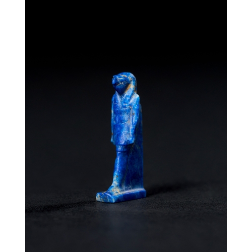 6 - AN EGYPTIAN LAPIS LAZULI AMULET, DEPICTING A FALCON-HEADED DEITY, LATE PERIOD TO PTOLEMAIC PERIOD, 6... 