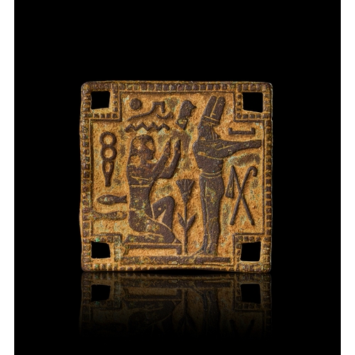 61 - A DOUBLE SIDED EGYPTIAN AMULATIC COPPER PLAUGE DEPICTING MAAT, CIRCA 1500 - 1400 B.C. This rare and ... 