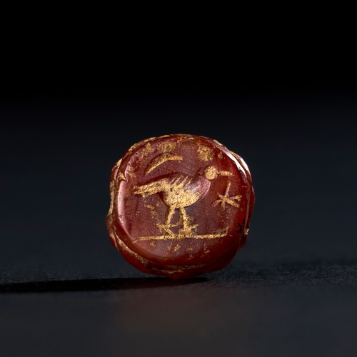 66 - SCARABOID AGATE BEAD WITH BIRD ENGRAVING, EGYPT, CIRCA 600 B.C. This finely crafted scaraboid agate ... 