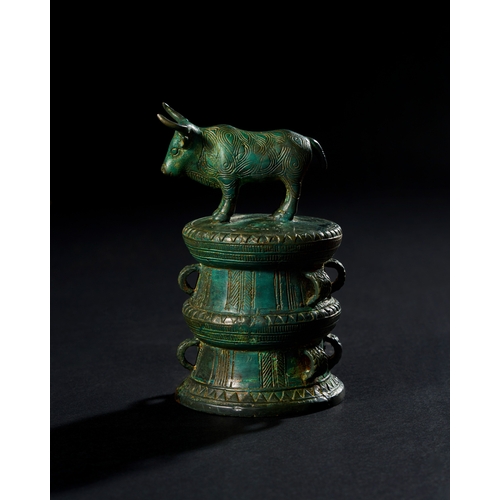 89 - A BRONZE COWRY CONTAINER WITH BULL ON TOP, CIRCA 2ND MILLENNIUM B.C. A BRONZE COWRY CONTAINER WITH B... 