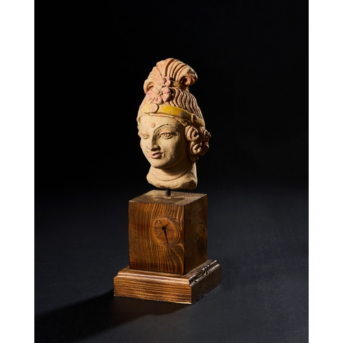 94 - INDIAN TERRACOTTA BUST IN THE STYLE OF 4TH - 5TH CENTURY A.D. Over all height: 26.5cm     Bust:... 