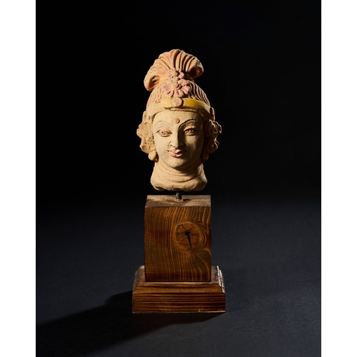 94 - INDIAN TERRACOTTA BUST IN THE STYLE OF 4TH - 5TH CENTURY A.D. Over all height: 26.5cm     Bust:... 