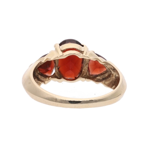 134 - 9ct Gold and Garnet Three Stone Ring, Size 6.75 | N 9ct Gold and Garnet Three Stone Ring            ... 