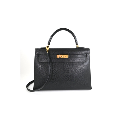 14 - Hermes Kelly 32 Black Evergrain Handbag Hermes Kelly 32 Black, 32cm    Hardware: Gold    Leather: Ev... 