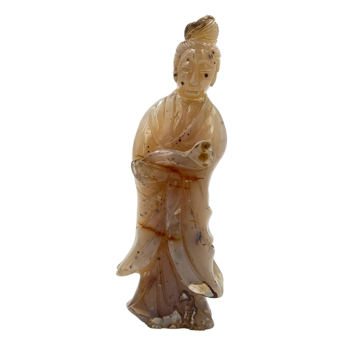 174 - A CARVED CHINESE AGATE FIGURE A CARVED CHINESE AGATE FIGURE    H: 21.5cm    ... 