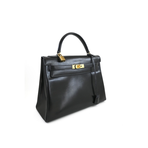 18 - Hermes Kelly 32 Black Box Handbag Hermes Kelly 32 Black, 32cm.     Hardware: Gold    Leather: B... 