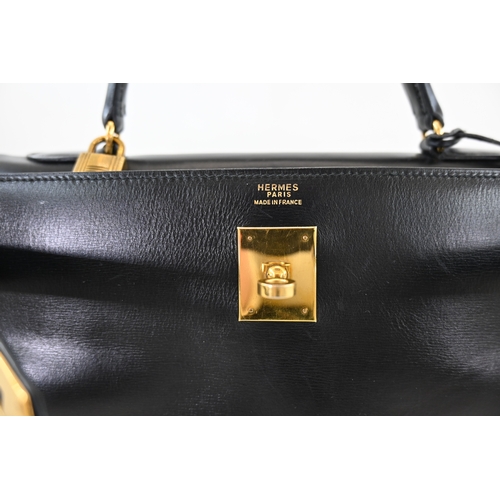 18 - Hermes Kelly 32 Black Box Handbag Hermes Kelly 32 Black, 32cm.     Hardware: Gold    Leather: B... 