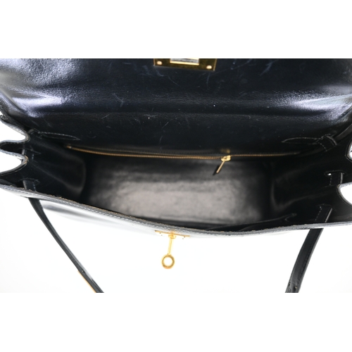 18 - Hermes Kelly 32 Black Box Handbag Hermes Kelly 32 Black, 32cm.     Hardware: Gold    Leather: B... 