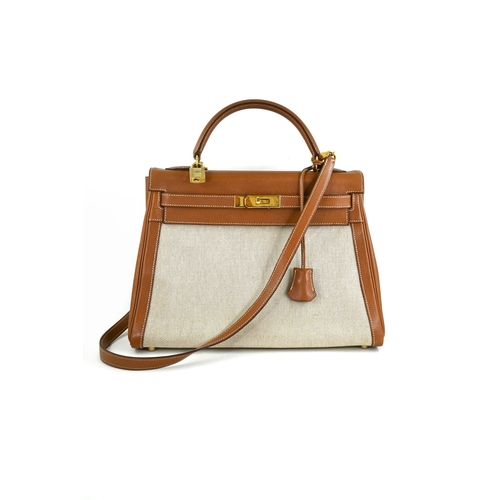 19 - Hermes Kelly 32 Gold & Natural Handbag Hermes Kelly 32 Gold + Naturel, 32cm.     Hardware: Gold... 