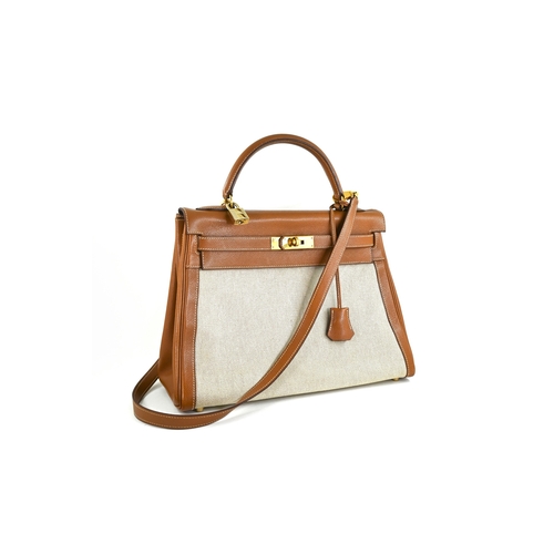 19 - Hermes Kelly 32 Gold & Natural Handbag Hermes Kelly 32 Gold + Naturel, 32cm.     Hardware: Gold... 