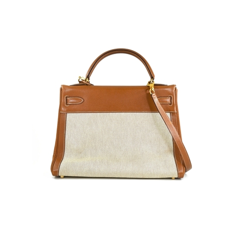 19 - Hermes Kelly 32 Gold & Natural Handbag Hermes Kelly 32 Gold + Naturel, 32cm.     Hardware: Gold... 