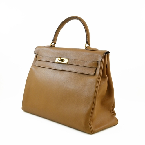 21 - Kelly 32 Natural Courchevel Handbag Hermes Kelly 32 Naturel, 32cm.     Hardware: Gold    Leathe... 