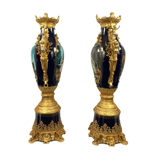 211 - A LARGE PAIR OF PORCELAIN SEVRES STYLE VASES A LARGE PAIR OF SEVRES STYLE VASES     H: 136cm&nb... 