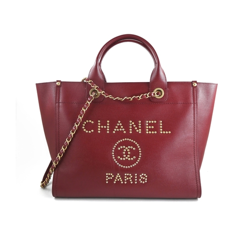 3 - A Red Chanel Deauville PM Tote Chanel Deauville PM Tote in Red, 33cm.     Hardware: Gold    Lea... 