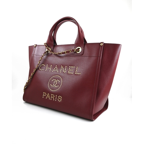 3 - A Red Chanel Deauville PM Tote Chanel Deauville PM Tote in Red, 33cm.     Hardware: Gold    Lea... 