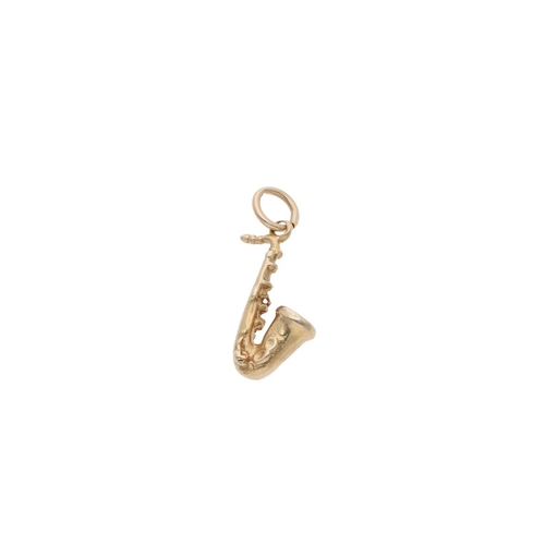 61 - 9ct Gold Saxophone Instrument Charm. 9ct Gold Saxophone Instrument Charm.            HALLMARKS: Mark... 