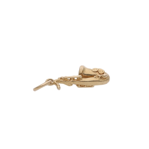 61 - 9ct Gold Saxophone Instrument Charm. 9ct Gold Saxophone Instrument Charm.            HALLMARKS: Mark... 