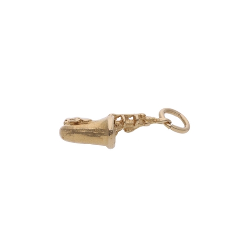 61 - 9ct Gold Saxophone Instrument Charm. 9ct Gold Saxophone Instrument Charm.            HALLMARKS: Mark... 