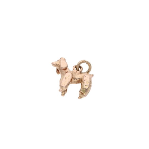 84 - 9ct Gold Poodle Dog Charm. 9ct Gold Poodle Dog Charm.            HALLMARKS: marked for 9ct Gold     ... 