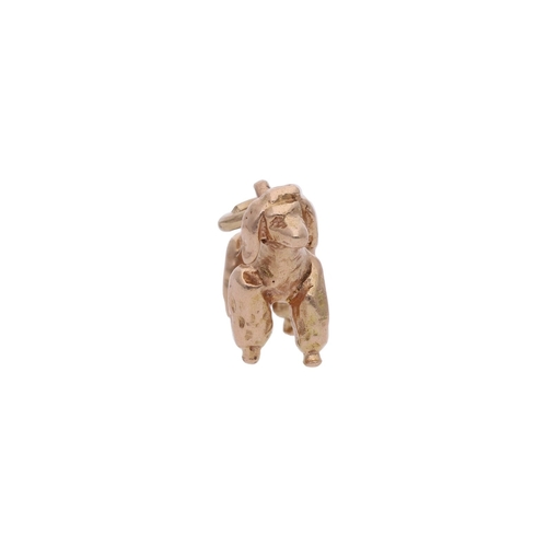 84 - 9ct Gold Poodle Dog Charm. 9ct Gold Poodle Dog Charm.            HALLMARKS: marked for 9ct Gold     ... 