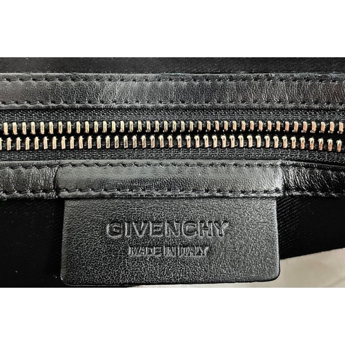 8 - A Givenchy Nightingale Handbag Givenchy Nightengale in Black, 42cm.     Hardware: Gold    Leath... 