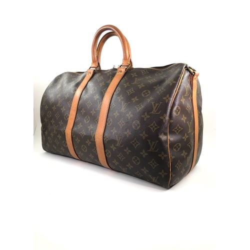 10 - Louis Vuitton Keepall Bag Louis Vuitton Keepall, 45cm.     Hardware: Gold    Leather: Leather... 