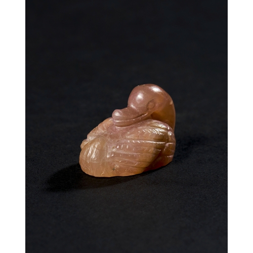 11 - CHALCEDONY AGATE AMULET OF A SEATED DUCK, ACHAEMENID PERIOD, PROBABLY 500-600 B.C. A chalcedony agat... 