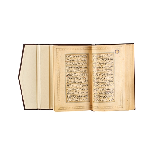 112 - AN ILLUMINATED QURAN, INDIA, MUGHAL, 19TH CENTURY This exquisitely illuminated 19th century Quran, f... 