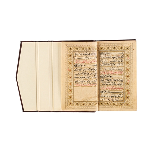 112 - AN ILLUMINATED QURAN, INDIA, MUGHAL, 19TH CENTURY This exquisitely illuminated 19th century Quran, f... 