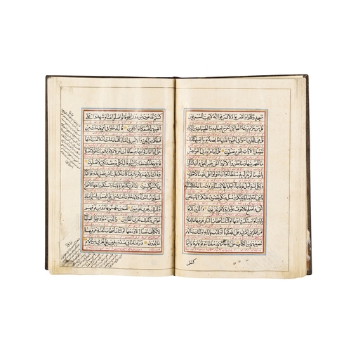 117 - A LARGE ILLUMINATED QURAN, QAJAR, 19TH CENTURY A 19th-century Qajar Quran features elaborate, illumi... 