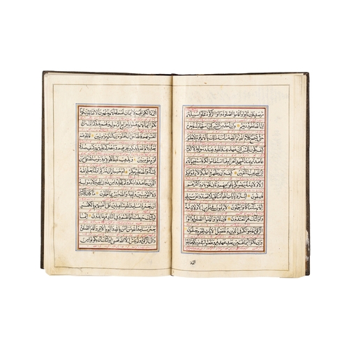 117 - A LARGE ILLUMINATED QURAN, QAJAR, 19TH CENTURY A 19th-century Qajar Quran features elaborate, illumi... 