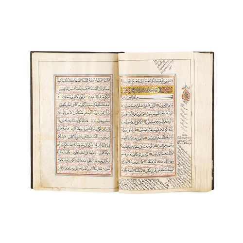 117 - A LARGE ILLUMINATED QURAN, QAJAR, 19TH CENTURY A 19th-century Qajar Quran features elaborate, illumi... 