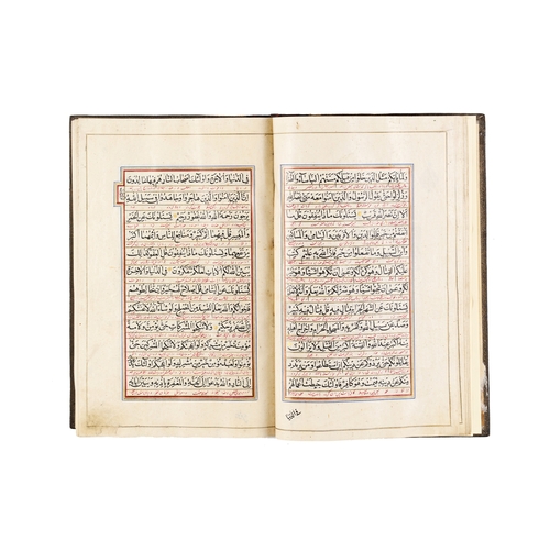 117 - A LARGE ILLUMINATED QURAN, QAJAR, 19TH CENTURY A 19th-century Qajar Quran features elaborate, illumi... 