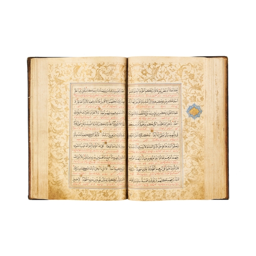 118 - A LARGE ILLUMINATED SAFAVID QURAN DATED AH 1119 / A.D. 1707 This large Safavid Quran, dated ahead of... 