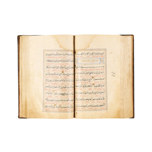 118 - A LARGE ILLUMINATED SAFAVID QURAN DATED AH 1119 / A.D. 1707 This large Safavid Quran, dated ahead of... 