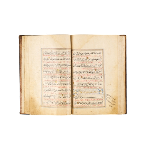 118 - A LARGE ILLUMINATED SAFAVID QURAN DATED AH 1119 / A.D. 1707 This large Safavid Quran, dated ahead of... 