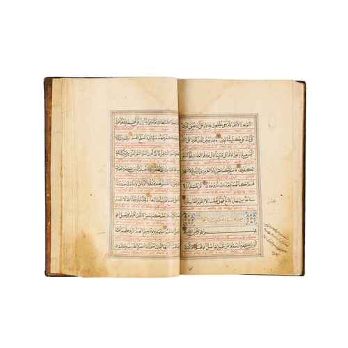 118 - A LARGE ILLUMINATED SAFAVID QURAN DATED AH 1119 / A.D. 1707 This large Safavid Quran, dated ahead of... 