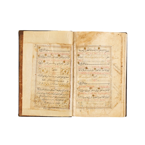 118 - A LARGE ILLUMINATED SAFAVID QURAN DATED AH 1119 / A.D. 1707 This large Safavid Quran, dated ahead of... 