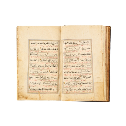 118 - A LARGE ILLUMINATED SAFAVID QURAN DATED AH 1119 / A.D. 1707 This large Safavid Quran, dated ahead of... 