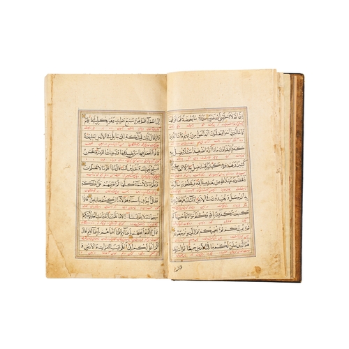 118 - A LARGE ILLUMINATED SAFAVID QURAN DATED AH 1119 / A.D. 1707 This large Safavid Quran, dated ahead of... 