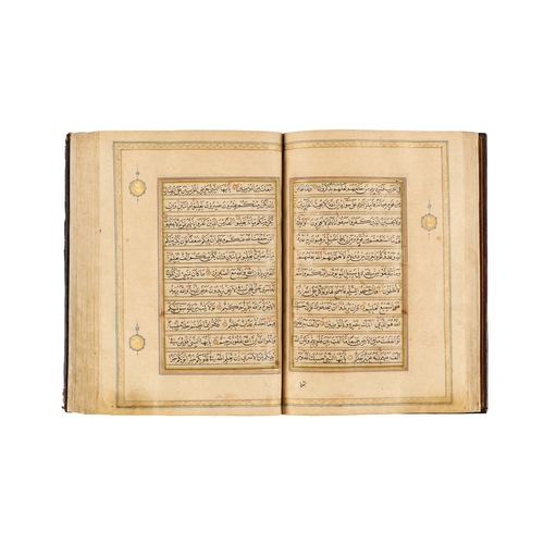 119 - A LARGE ILLUMINATED MUGHAL QURAN WITH SEAL OF MUTAMAD AL-SULTAN MUZAFFAR AL-DIN SHAH This impressive... 